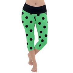 Large Black Polka Dots On Algae Green - Lightweight Velour Capri Yoga Leggings by FashionLane