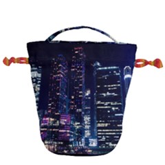 Black Building Lighted Under Clear Sky Drawstring Bucket Bag by Modalart
