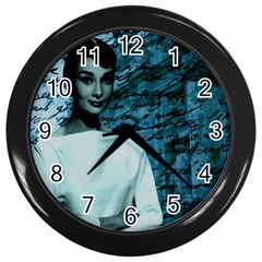 Audrey Hepburn Wall Clocks (black) by Valentinaart